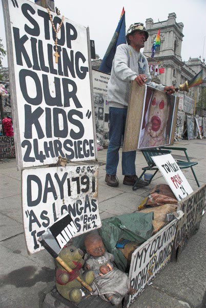 Brian Haw in Parliament Square © 2006, Peter Marshall